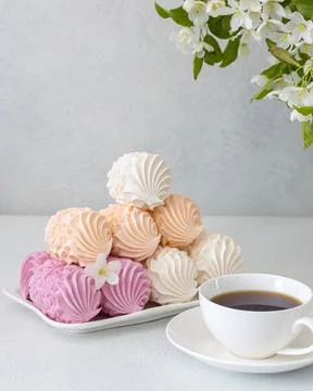 Assorted marshmallows for breakfast with a cup of fragrant coffee Stock Photos