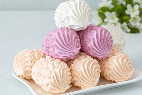 Assorted marshmallows for breakfast with a cup of fragrant coffee Stock Photos