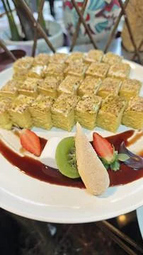 Assorted Matcha Green Tea Cake Squares on Buffet Dessert Platter Stock-Fotos