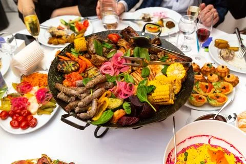Assorted meat and vegetables, fried in a wok Фото
