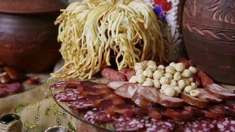 Assorted with meat, cheese and nuts on the wood tray Stock Footage 103287563