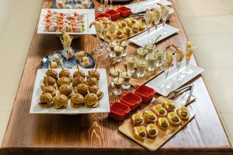 Assorted meat, stuffed chicken roll, a beautiful table with snacks. 스톡 사진