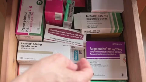 Assorted Medications in Drawer Including Paracetamol, Antibiotics and Sleep Aids Stock Footage 325418147