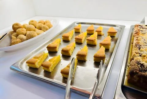Assorted Mini Desserts on Silver Trays Stock Photos