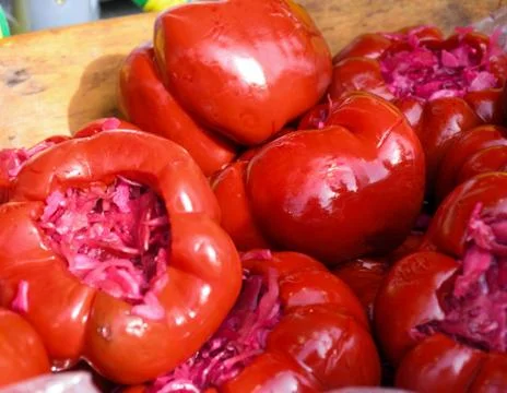 Assorted mix of pickles in sunlight during food festival. Pickled vegetables  Stock Photos