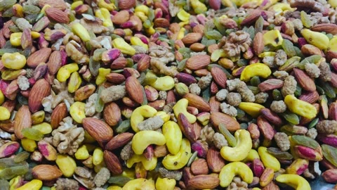 Assorted mixed nuts with cashews, almonds and walnuts, horizontal view Stock Footage 345156304