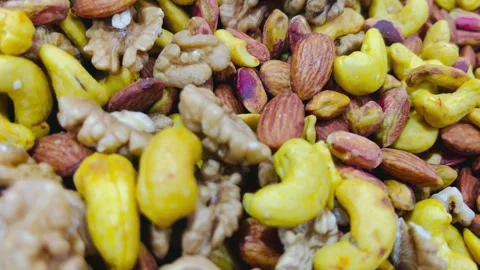 Assorted mixed nuts with walnuts and almonds, horizontal view Stock Footage 345156605