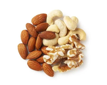 Assorted mixed nuts on white background Stock Photos
