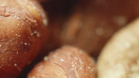 Assorted mixed shelled nuts macro close up presentation slowly rotating sto.. Stock Footage 344797817
