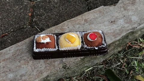 Assorted Mochi with Chocolate, Cheese, and Pineapple Flavors Stock Footage 297511920