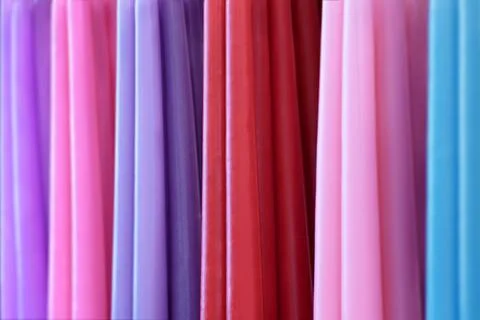 Assorted multicolour wax candles Stock Photos