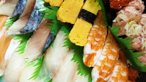 Assorted nigiri sushi on a tray, rotating Stock-Footage 318812042