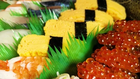 Assorted nigiri sushi on a tray, rotating Stock Footage 318812043