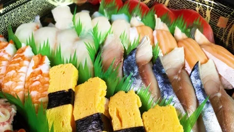 Assorted nigiri sushi on a tray, rotating Stock Footage 319412865