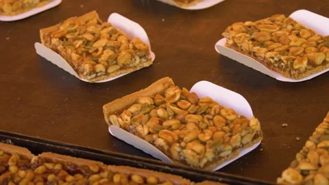 Assorted nut pastries at local bakery market Stock Footage 334655711