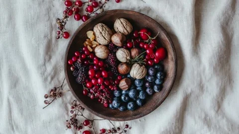 Assorted Nuts And Berries In Rustic Wooden Bowl On Linen Fabric Stock Footage 294506896
