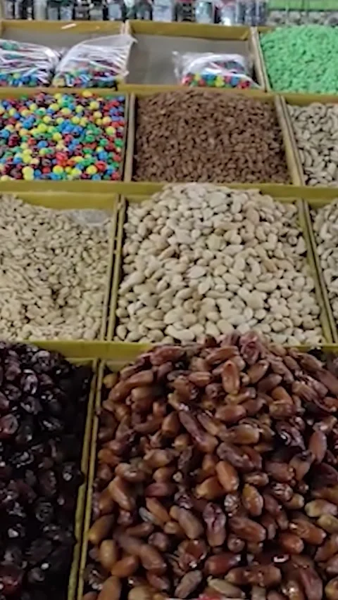 Assorted Nuts And Dried Fruits Displayed On Market Stall Stock Footage 342240305