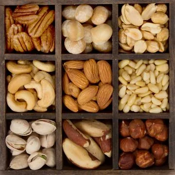 Assorted nuts for a background Stock Photos