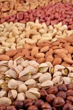 Assorted nuts background Stock Photos