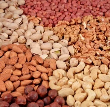 Assorted nuts background Stock Photos
