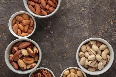 Assorted nuts on a dark background Stock Photos