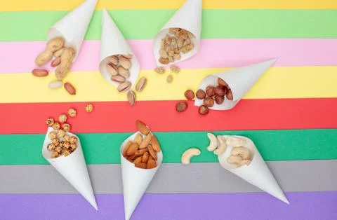 Assorted nuts served in paper cones Stock Photos