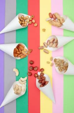 Assorted nuts served in paper cones Stock Photos