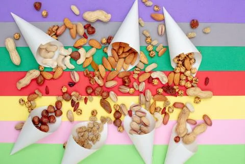 Assorted nuts served in paper cones Stock Photos