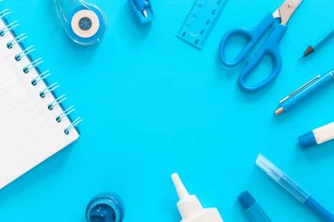 Assorted office and school white and blue stationery Stock Photos