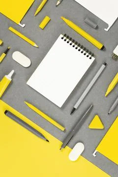 Assorted office and school white yellow and gray blue stationery Stock Photos