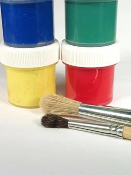 Assorted Paint Jars with Brushes Stock Photos