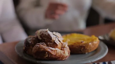 Assorted Pastries and Cakes Served on Table in Sydney Cafe with People Indoors Stock Footage 345691236