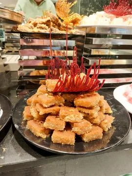 Assorted pastries and traditional Middle Eastern sweets displayed on a lavish Stock Photos