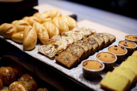 Assorted pastries in buffet Stock Photos