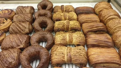 Assorted pastries on display Stock Footage 263132276