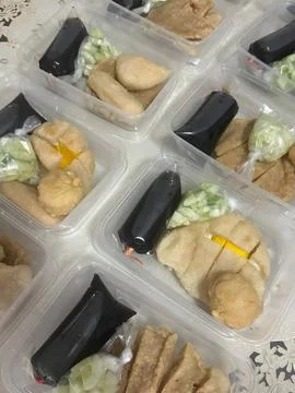 Assorted Pempek Fishcakes Packaging in Clear Plastic Boxes 写真素材