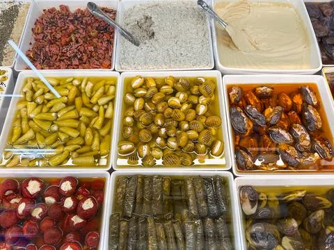 Assorted Pickled Foods and Dates at Dubai Market Stock Photos