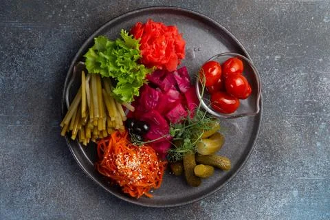 Assorted pickled vegetables in a bowl. Stock Photos