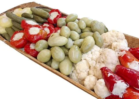 Assorted pickled vegetables, including red peppers, cauliflower, green toma.. Foto stock