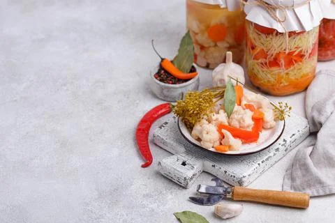 Assorted of pickled vegetables in jars Stock Photos