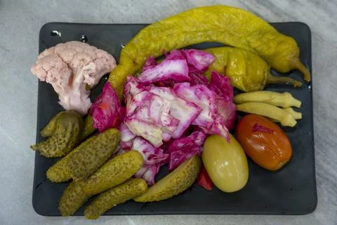 Assorted pickles on a plate, Assorted pickles Stock Photos