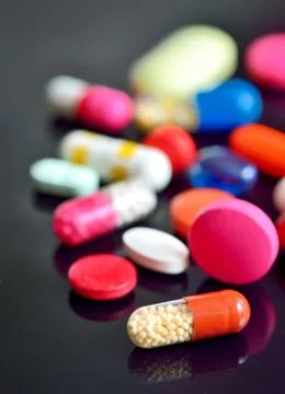 Assorted pills and capsules Stock Photos