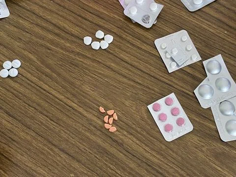 Assorted Pills on a Table Stock Photos