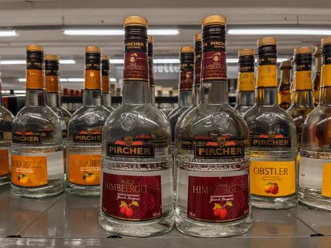 Assorted Pircher Fruit Liqueurs Displayed on Shelves Stock-Fotos