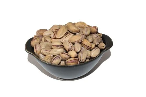 Assorted pistachios in white background Stock-Fotos