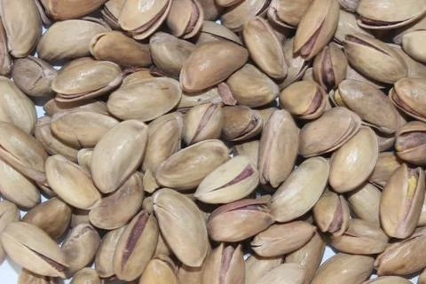 Assorted pistachios in white background Stock Photos
