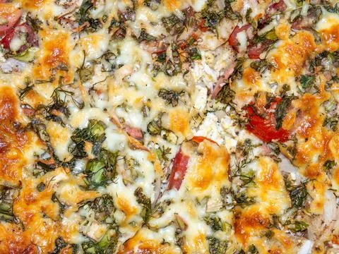 Assorted pizza background. Homemade vegetable pie. Open pie. Caloric nutritio Stock Photos
