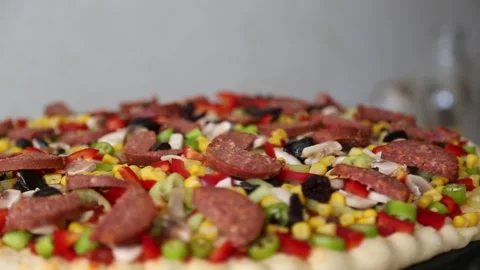 Assorted Pizza Toppings Ready for Cooking Stock Footage 343746642