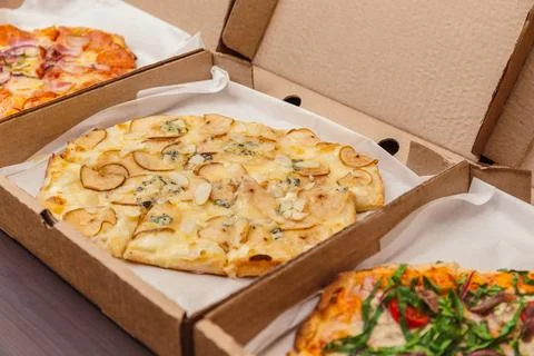 Assorted Pizzas In Boxes: Pear And Blue Cheese Featured Stock Photos