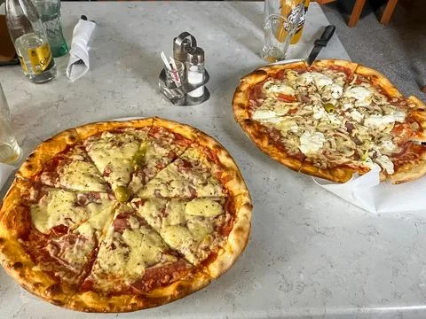 Assorted Pizzas Served on a Dining Table Foto stock
